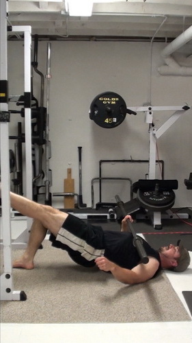 One-Arm Barbell Floor Press In Single-Leg Bridge Position
