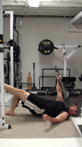 One-Arm Barbell Floor Press In Single-Leg Bridge Position