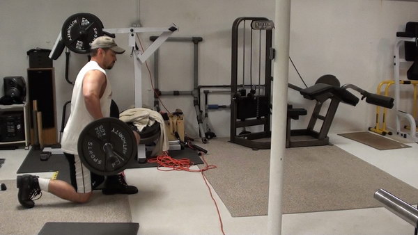 Get Better Legs and Killer Cardio Training With Bar-In-Front Walking Lunges