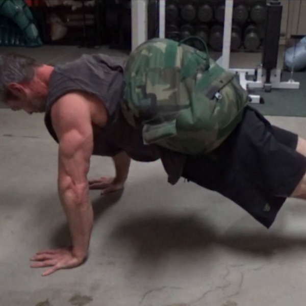 Sandbag on Back Push-Ups 150 lbs
